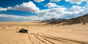 A quad bike on a desert trail, the subject of a potential accident compensation claim.